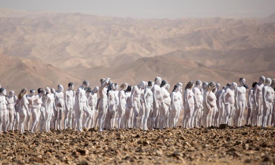 Nude models pose for a photograph by Spencer Tunick in Arad, Israel.