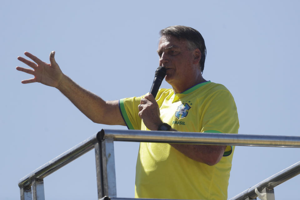 Brazil's former President Jair Bolsonaro speaks during a demonstration calling for freedom of expression, spurred by Brazilian court orders to suspend accounts on the social media platform X, in Copacabana beach, Rio de Janeiro, Brazil, Sunday, April 21, 2024. (AP Photo/Bruna Prado)