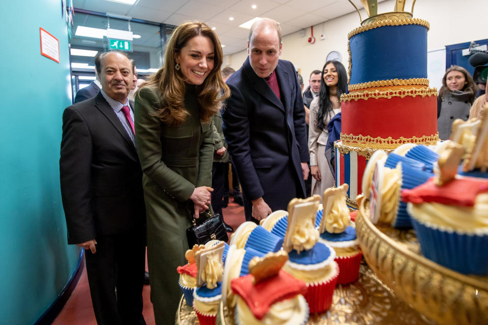 BRADFORD, ENGLAND - JANUARY 15: Prince William, Duke of Cambridge and Catherine, Duchess of Cambridge inspect cakes as they visit the Khidmat Centre on January 15, 2020 in Bradford, United Kingdom. (Photo by Charlotte Graham - WPA Pool/Getty Images)