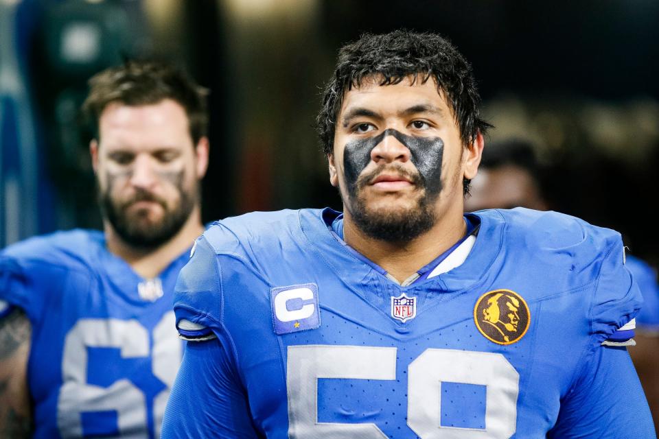 Detroit Lions right tackle Penei Sewell takes the field for the second half against the Green Bay Packers at Ford Field in Detroit on Thursday, Nov. 23, 2023.