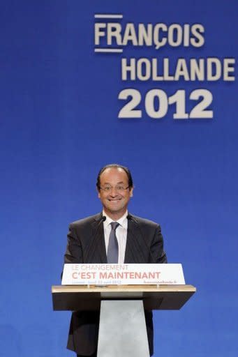 France's Socialist Party (PS) candidate for the 2012 French presidential election Francois Hollande gives a speech during a campaign meeting in the city of Lorient