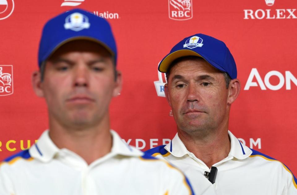 Team Europe captain Padraig Harrington, at right alongside Paul Casey, during a press conference after their heavy defeat to Team USA (Anthony Behar/PA) (PA Wire)