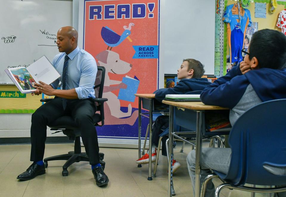 Maryland Gov. Wes Moore reads a book to fourth graders at the governor's visit Wednesday, March 22, 2023, to Eastern Elementary School.