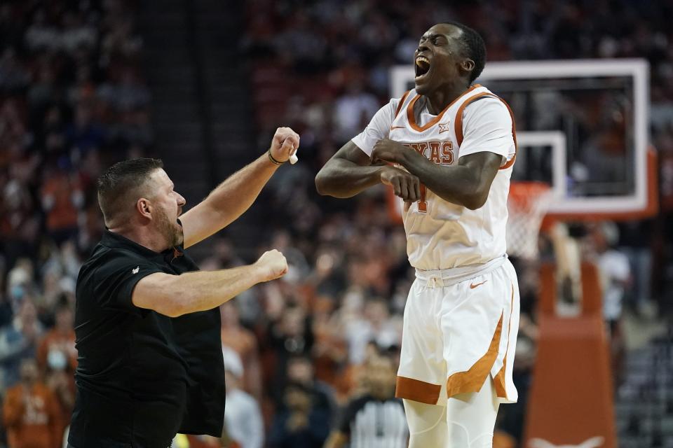 Texas coach Chris Beard and guard Andrew Jones celebrate during the 66-52 win over Oklahoma on Jan. 11. “Andrew Jones, I mean, he’s the toughest guy I’ve ever met,” Beard said. “He beat cancer. He’s not supposed to be here. He not only beat it, he’s playing basketball. He’s not only playing, he’s an all-conference player. The story is real."