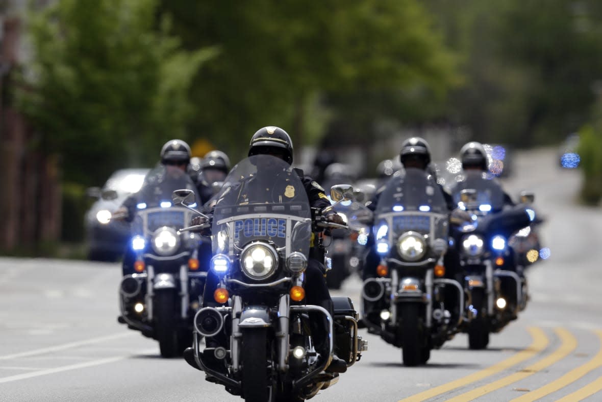 ATLANTA, GA – APRIL 4: The casket of The Rev. Joseph E. Lowery departs Cascade United Methodist church behind a police motorcade by horse and carriage, April 4, 2020, in Atlanta. For more than four decades after the death of his friend and civil rights icon, the Rev. Martin Luther King Jr., the fiery Alabama preacher was on the front line of the battle for equality, with an unforgettable delivery that rivaled Kings and was often more unpredictable. (Photo by Brynn Anderson-Pool/Getty Images)
