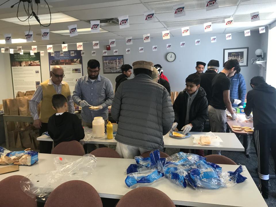 Members of Rochester's Ahmadiyya Muslim Community chapter assemble food for donation to a local shelter in 2020. The Ahmaddiyya community engages in numerous humanitarian and public outreach efforts.