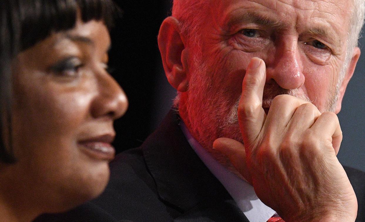 Britain's opposition Labour Party Shadow Home Secretary Diane Abbott (L) and Britain's opposition Labour party leader Jeremy Corbyn listen to a speech on the third day of the Labour party conference in Liverpool, north west England on September 25, 2018. (Photo by Oli SCARFF / AFP)        (Photo credit should read OLI SCARFF/AFP/Getty Images)