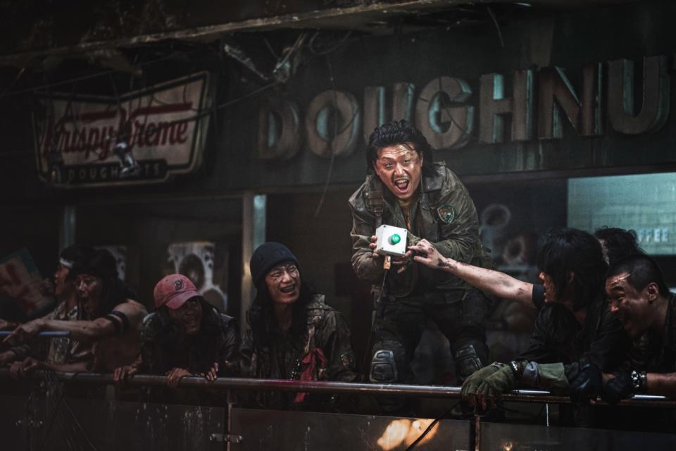 Sgt. Hwang (Kim Min-jae, center) leads a squadron of marauders in "Peninsula."