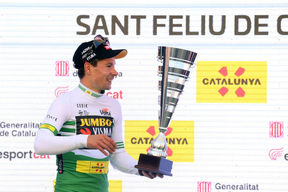 SANT FELIU DE GUIXOLS SPAIN  MARCH 20 Primoz Roglic of Slovenia and Team JumboVisma celebrates at podium as Green leader jersey winner during the 102nd Volta Ciclista a Catalunya 2023 Stage 1 a 1646km stage from Sant Feliu de Guxols to Sant Feliu de Guxols  VoltaCatalunya102  on March 20 2023 in Sant Feliu de Guixols Spain Photo by David RamosGetty Images