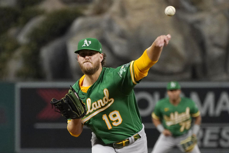 Oakland Athletics starting pitcher Cole Irvin throws to the plate during the first inning of a baseball game against the Los Angeles Angels Thursday, Sept. 29, 2022, in Anaheim, Calif. (AP Photo/Mark J. Terrill)