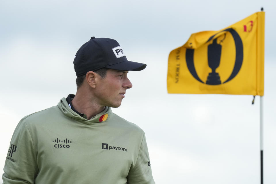 Viktor Hovland and the rest of the field played through winds at the Open Championship that had flags blowing wide open. (AP Photo/Jon Super)