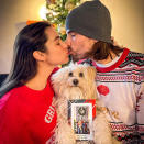 <p>Pup Lois Lane may not be thrilled about her parents' PDA, but she's a pro, still nailing her pose to display the <em>Bachelor in Paradise</em> stars' card this year. </p>
