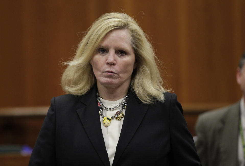 FILE - Santa Clara County Sheriff Laurie Smith walks into a Santa Clara County courtroom in San Jose, Calif., on May 24, 2012. The trial of the longtime California sheriff on public corruption allegations involving her office's granting of concealed-carry weapons permits and costly jail mismanagement was set to begin with jury selection Wednesday, Sept. 21, 2022. (AP Photo/Paul Sakuma, File)