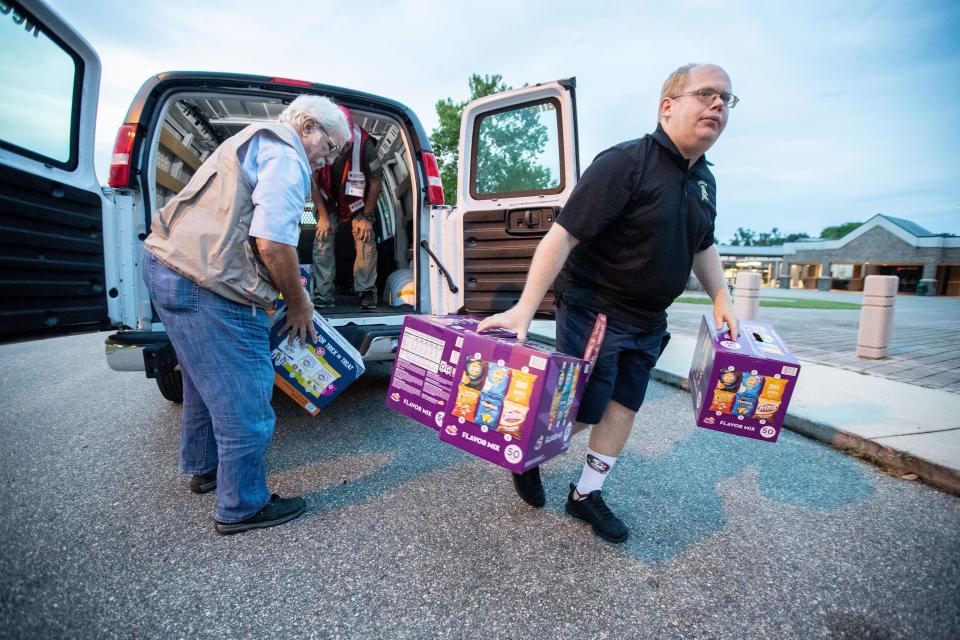 The Red Cross delivers snacks to Lincoln High School where Floridans have taken shelter from Hurricane Idalia on Tuesday, Aug. 29, 2023.