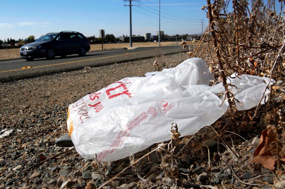 Some stores recycle plastic bags to keep them off the streets, but bag recycle collection has decreased since several towns no longer allow single-use plastic bags. [AP file]