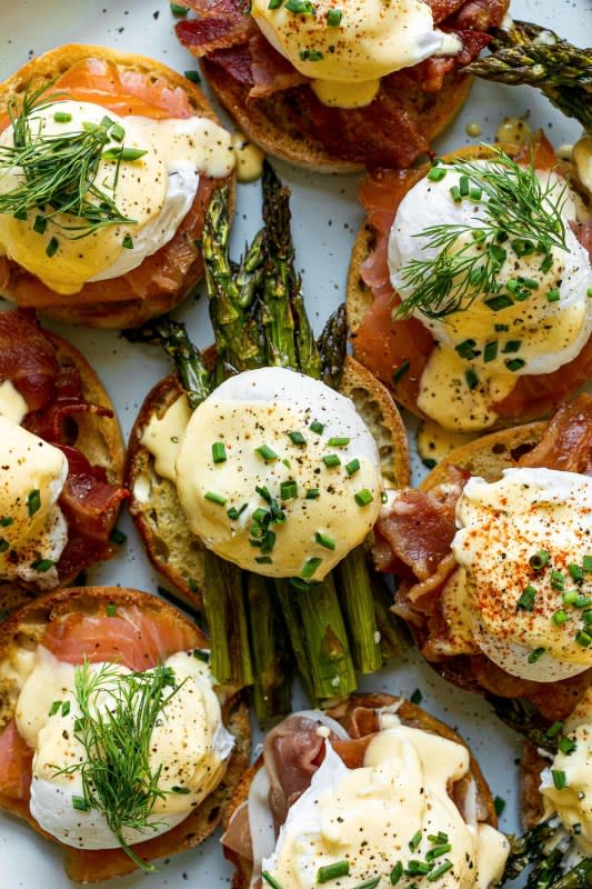 <p>Plays Well With Butter</p><p>Brunch truly does not get better than eggs benedict! With perfectly poached eggs, luscious and silky hollandaise sauce, and toasty bread to soak it all up, it’s the ultimate indulgence.</p><p><strong>Get the recipe: <a href="https://playswellwithbutter.com/eggs-benedict-for-a-crowd/" rel="nofollow noopener" target="_blank" data-ylk="slk:Easy Eggs Benedict;elm:context_link;itc:0;sec:content-canvas" class="link rapid-noclick-resp"><em>Easy Eggs Benedict</em></a></strong></p>