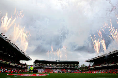 Fireworks explode during farewell celebrations at Highbury May 7, 2006. REUTERS/Eddie Keogh/File Photo