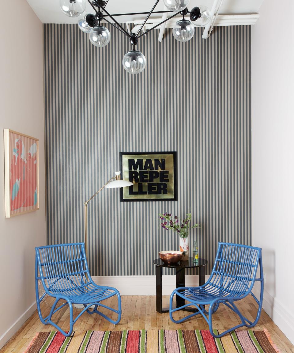 A reception area with some edge. Who knew rattan could look so good in blue?