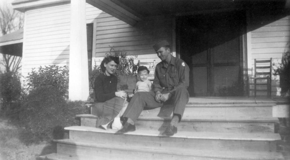 In this image provided by the McConnell Center at the University of Louisville, Mitch McConnell sits with his parents, Julia "Dean" and A.M. McConnell in this image from the mid 1940's in Five Points, Ala. As the coronavirus pandemic unfolds, Senate Majority Leader Mitch McConnell flashes back to an earlier crisis that gripped the nation, and his own life, when he was a boy. He was struck with polio. (McConnell Center at the University of Louisville via AP)