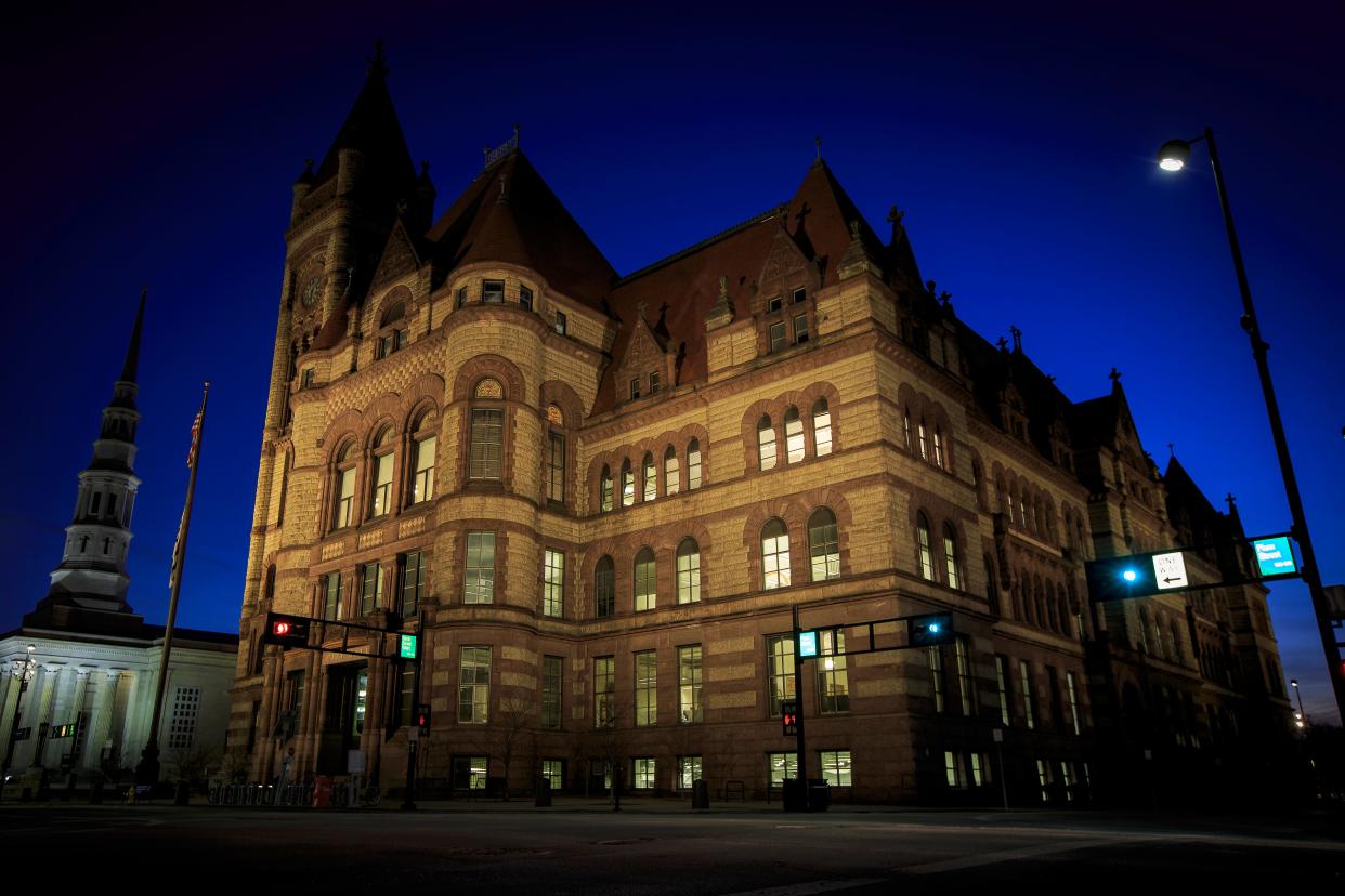 The lights of Cincinnati City Hall will remain illuminated overnight between January 19 and January 20, 2021 to celebrate the peaceful transfer of power of the President of the United States of America, as seen downtown on Tuesday, Jan. 19, 2021.