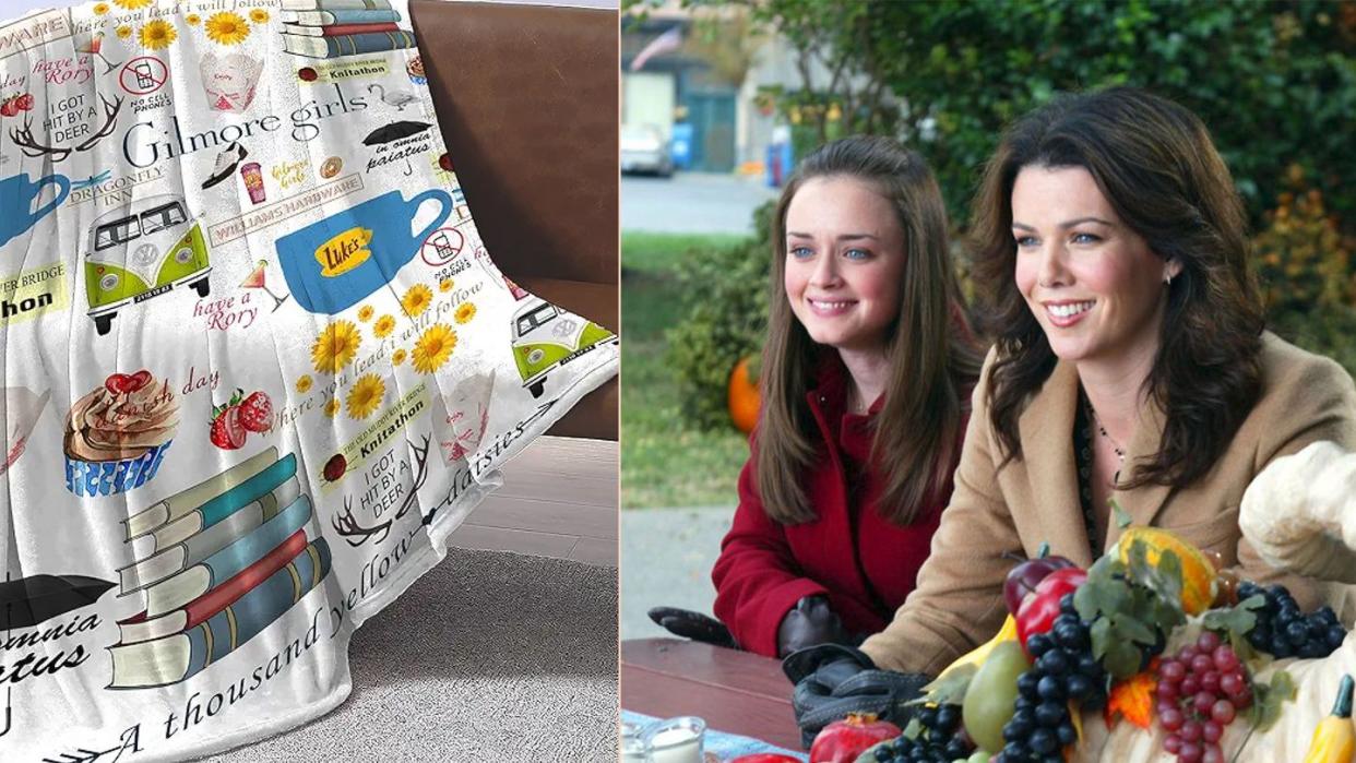 a couple of women sitting at a table and a blanket