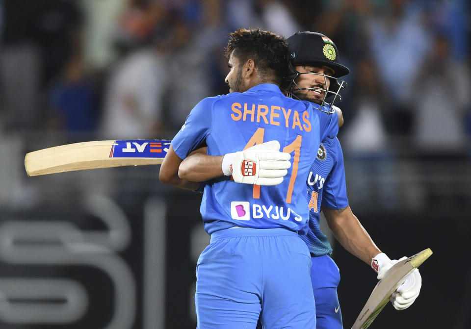 India's Manish Pandy and Shreyas Iyer celebrate during the Twenty/20 cricket international between India and New Zealand in Auckland, New Zealand, Friday, Jan. 24, 2020. (Andrew Cornaga/Photosport via AP)