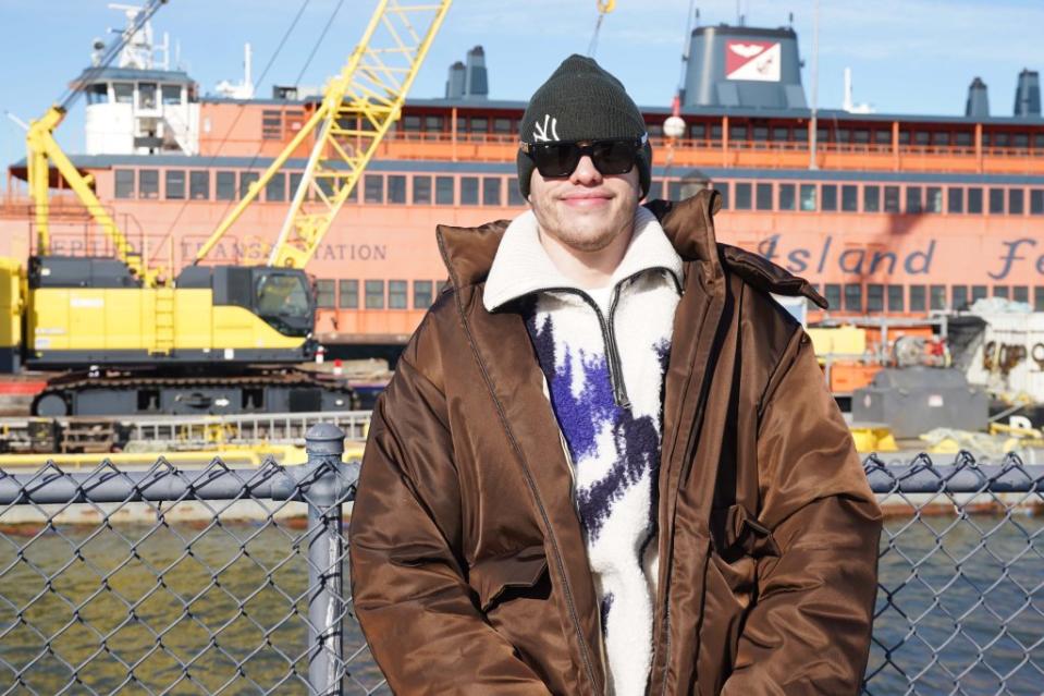 Davidson poses in front of the John F. Kennedy ferry. Robert Miller