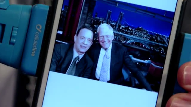As we near David Letterman's last <em>Late Show</em>, the beloved host has been snapping selfies with his famous friends, and on Monday, Tom Hanks took it to the next level. During his appearance on the CBS show, the 58-year-old actor whipped out a selfie stick for his pic with Letterman. <strong> VIDEO: George Clooney Handcuffs Himself to David Letterman </strong> CBS Hanks quipped that his wife Rita Wilson "announced when they first came out that we would never ever have a selfie stick in the house." However, now they are "all over Florence, which was the birthplace of the Renaissance." The selfie apparatus came highly recommended by Hanks who snapped the pic high enough to hide the men's double chins. "In a couple of weeks when you head down to -- I'm just gonna guess what you're gonna be up to, two words -- Space Camp, take one of these bad boys with you," he encouraged the 68-year-old host. <strong>VIDEO: David Letterman Locks Lips with Julia Roberts! </strong> Letterman's last <em> Late Show </em>is Wednesday, May 20. Here's what you can expect: