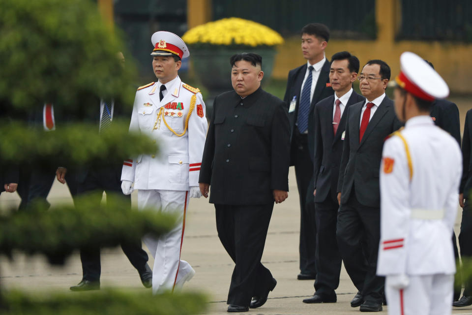 North Korean leader Kim Jong Un, center, attends a wreath laying ceremony at Ho Chi Minh Mausoleum in Hanoi, Vietnam Saturday, March 2, 2019. (Jorge Silva/Pool Photo via AP)