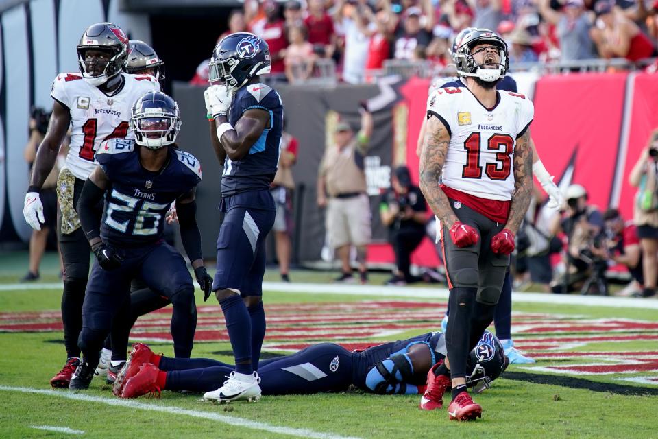 Tampa Bay Buccaneers wide receiver Mike Evans celebrates his touchdown against the Tennessee Titans during the third quarter at Raymond James Stadium in Tampa, Fla., Sunday, Nov. 12, 2023.