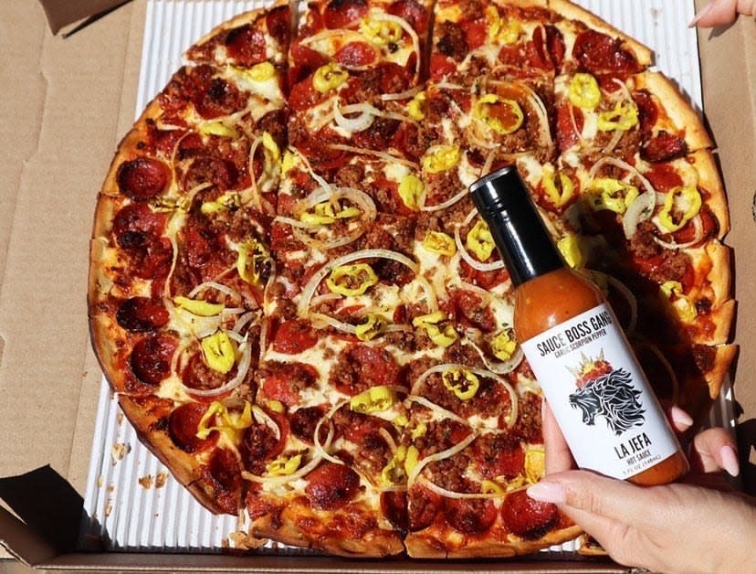 The Hot Boss, a specialty pizza from Carlucci's Pizzeria near Powell, includes La Jefa, a garlic and scorpion pepper sauce from the Sauce Boss Gang of Columbus.