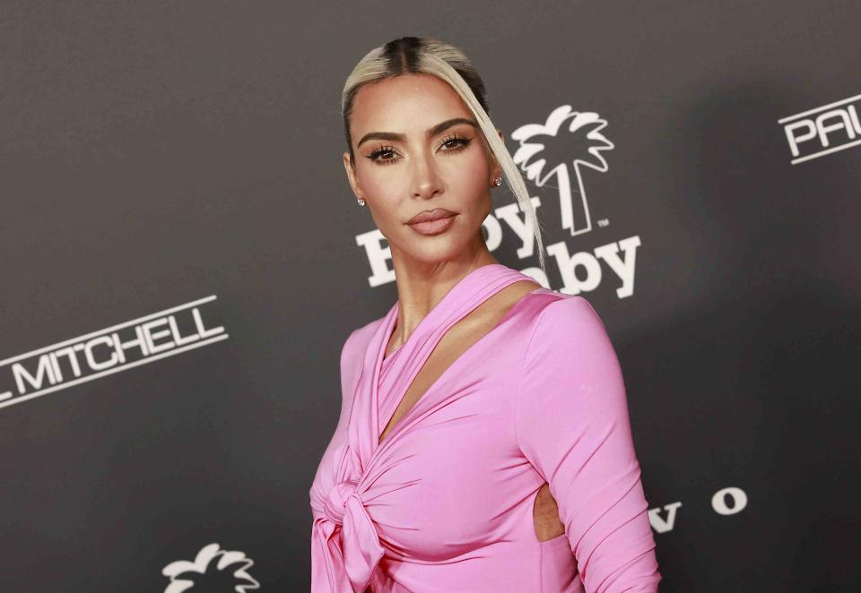 <p>MICHAEL TRAN/AFP via Getty Images</p> Kim Kardashian is celebrating the purchase of a new home in Malibu, Calif.