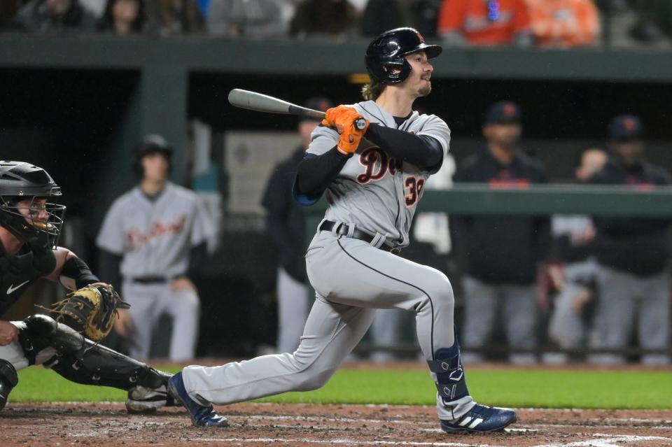 Detroit Tigers second baseman Zach McKinstry (39) swings through a solo home run in the seventh inning against the Baltimore Orioles at Oriole Park at Camden Yards in Baltimore on Saturday, April 22, 2023.