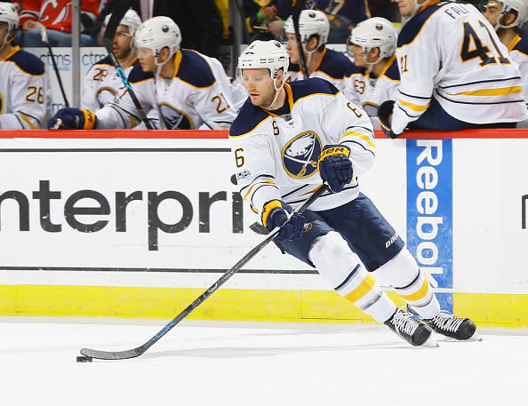 NEWARK, NJ - FEBRUARY 06: Cody Franson #6 of the Buffalo Sabres plays the puck against the New Jersey Devils during the game at Prudential Center on February 6, 2017 in Newark, New Jersey. (Photo by Andy Marlin/NHLI via Getty Images)