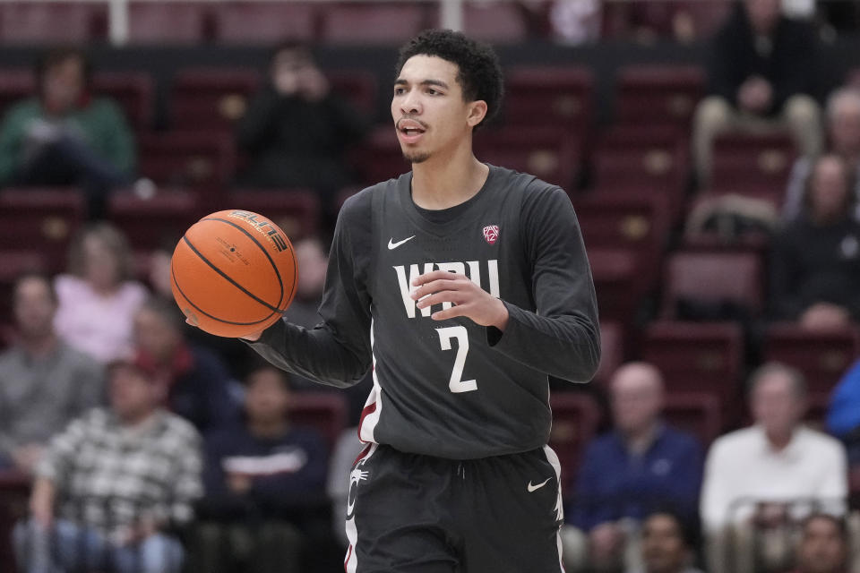 Washington State guard Myles Rice brings the ball up against Stanford during the second half of an NCAA college basketball game in Stanford, Calif., Thursday, Jan. 18, 2024. (AP Photo/Jeff Chiu)