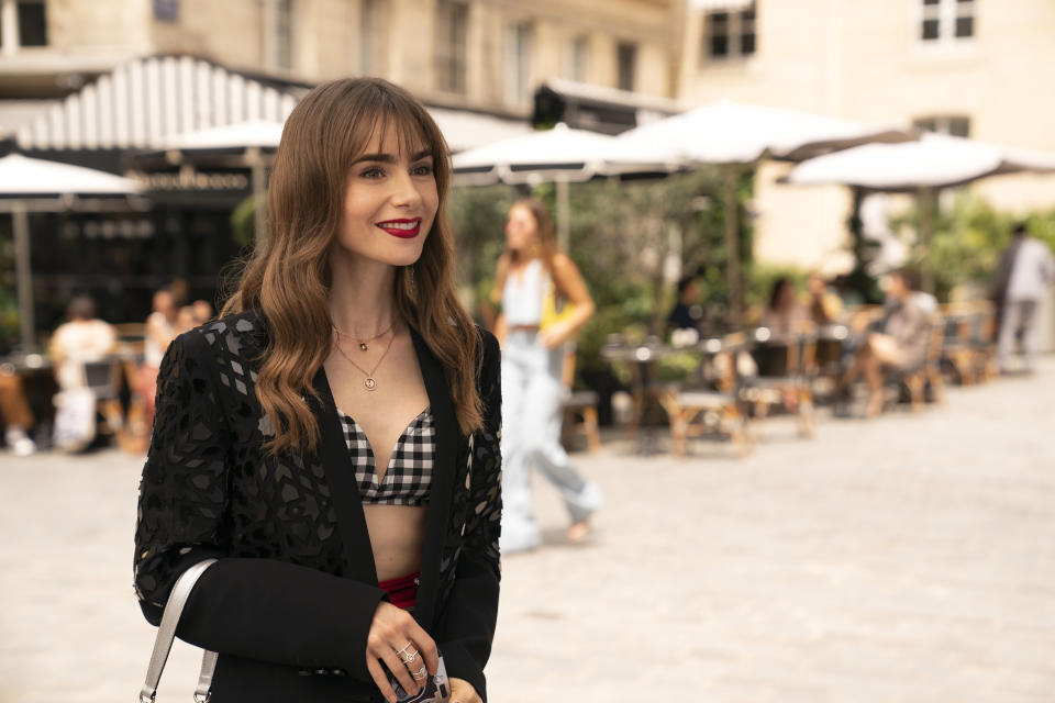 Emily In Paris. Lily Collins as Emily in episode 305 of Emily In Paris. Cr. StÃ©phanie Branchu/Netflix Â© 2022