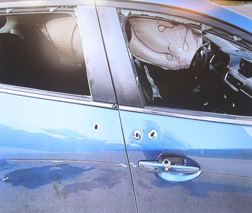 A photo of the bullet-ridden car of George Jenson was presented by prosecutors during the trial of Dacarrei Kinard on Tuesday in Akron, Ohio. Kinard is accused of shooting and killing Jenson in a May road rage incident along Interstate 76 in Norton.