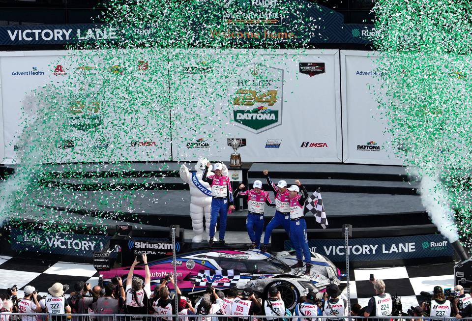 Meyer Shank Racing drivers celebrate in Victory Lane after the winning the Rolex 24 at Daytona at Daytona International Speedway, Sunday, Jan. 29, 2023.