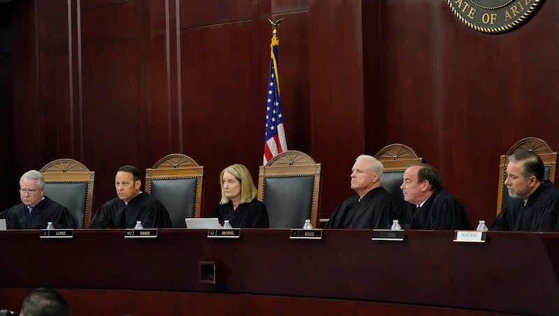 Arizona Supreme Court Justices from left; William G. Montgomery, John R Lopez IV, Vice Chief Justice Ann A. Scott Timmer, Chief Justice Robert M. Brutinel, Clint Bolick and James Beene listen to oral arguments on April 20, 2021, in Phoenix. The Arizona Supreme Court ruled Tuesday, April 9, 2024, that the state can enforce its long-dormant law criminalizing all abortions except when a mother’s life is at stake.