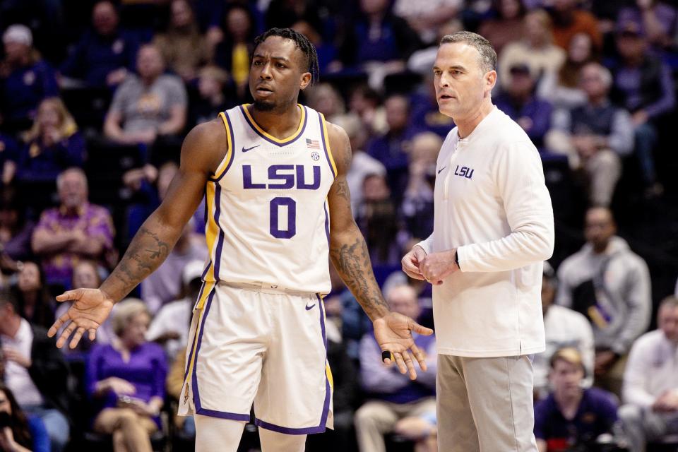 Feb 24, 2024; Baton Rouge, Louisiana, USA; LSU Tigers head coach Matt McMahon talks to guard Trae Hannibal (0) against the Mississippi State Bulldogs at Pete Maravich Assembly Center. Mandatory Credit: Stephen Lew-USA TODAY Sports