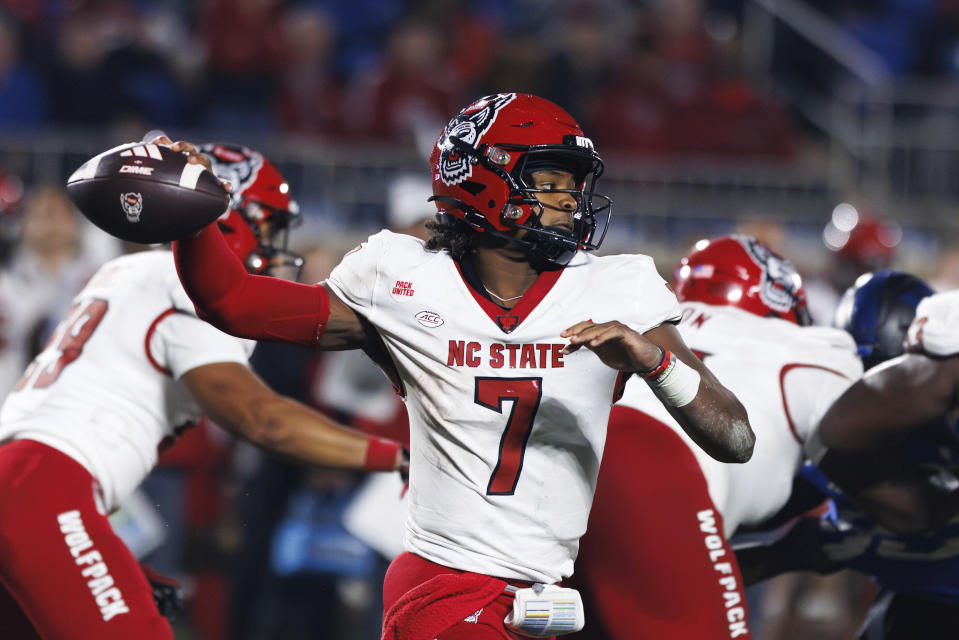 North Carolina State's MJ Morris (7) looks to a throw during the second half of an NCAA college football game against Duke in Durham, N.C., Saturday, Oct. 14, 2023. (AP Photo/Ben McKeown)