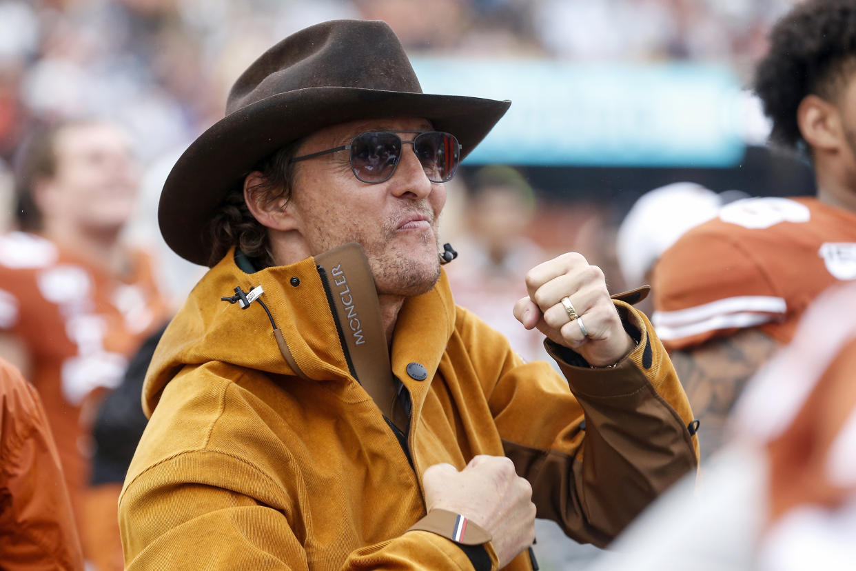 AUSTIN, TX - NOVEMBER 29:  Actor Matthew McConaughey celebrates on the Texas Longhorns sideline in the second half against the Texas Tech Red Raiders at Darrell K Royal-Texas Memorial Stadium on November 29, 2019 in Austin, Texas.  (Photo by Tim Warner/Getty Images)