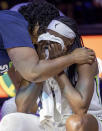 Minnesota Lynx center Sylvia Fowles cries during a tribute for her, at the team's WNBA basketball game against the Seattle Storm on Friday, Aug. 12, 2022, in Minneapolis. (Elizabeth Flores/Star Tribune via AP)