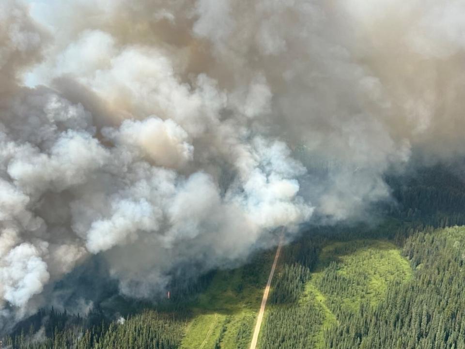 JASPER, CANADA - JULY 24 : (----EDITORIAL USE ONLY 'MANDATORY CREDIT - ALBERTA WILDFIRE SOCIAL MEDIA ACCOUNT/HANDOUT' - NO MARKETING NO ADVERTISING CAMPAIGNS - DISTRIBUTED AS A SERVICE TO CLIENTS----) An aerial photo shows wildfire smoke rising over Jasper National Park, Alberta, Canada on July 24, 2024. (Photo by ALBERTA WILDFIRE/HANDOUT/Anadolu via Getty Images)