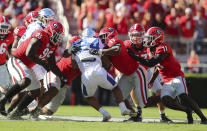 Georgia defenders smother Kentucky running back Chris Rodriguez Jr.during the first quarter of an NCAA college football game against Kentucky, Saturday, Oct. 16, 2021, in Athens, Ga. (Curtis Compton/Atlanta Journal-Constitution via AP)