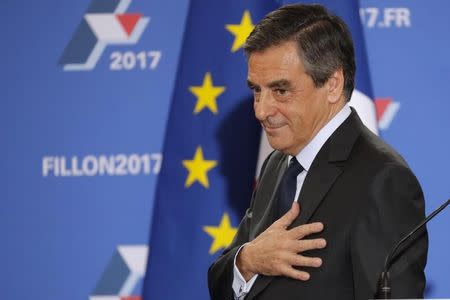 Francois Fillon, former French prime minister and member of Les Republicains political party, delivers his speech after partial results in the second round for the French center-right presidential primary election in Paris, France. REUTERS/Philippe Wojazer