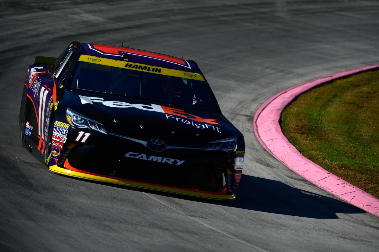 Denny Hamlin is one of four Joe Gibbs Racing cars in the third round of the Chase. (Getty)