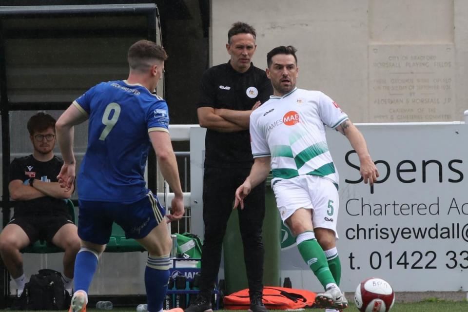 Mark Bower watches on from the dugout while in charge at Avenue last season. <i>(Image: John Rhodes.)</i>