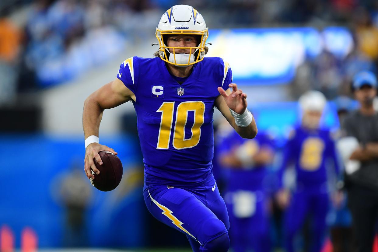 The Los Angeles Chargers quarterback will have to find Justin Herbert (10) a new No. 1 target after trading away veteran Keenan Allen. Mandatory Credit: Gary A. Vasquez-USA TODAY Sports ORG XMIT: IMAGN-451714 ORIG FILE ID: 20211212_gav_sv5_046.jpg