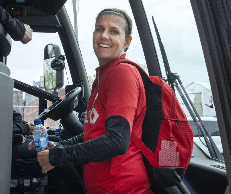 Canada's national women's soccer team captain Christine Sinclair boards there team bus after practice Thursday, Oct. 26, 2023, in Montreal. (Ryan Remiorz/The Canadian Press via AP)